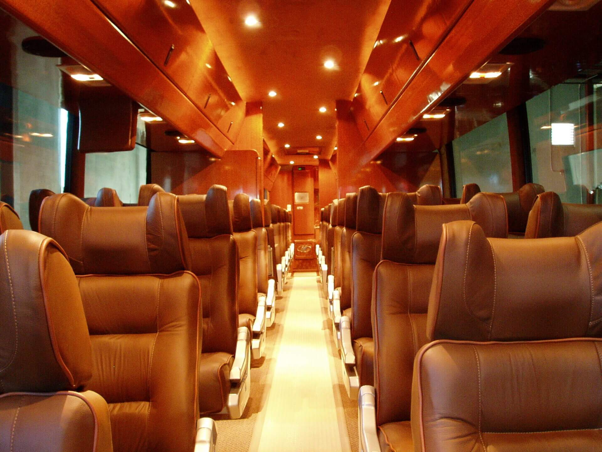 inside view of a bus with lights and seats